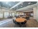 Spacious community room featuring neutral tones, ample seating, and natural light at 3201 Glenmere Way, Orlando, FL 32828