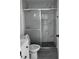 Clean bathroom with updated vanity, toilet, and shower at 3446 Cypress Point Cir, St Cloud, FL 34772