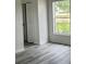 Bright bedroom with large window allowing natural light in at 3446 Cypress Point Cir, St Cloud, FL 34772