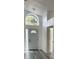 Bright entryway features front door and high ceilings at 3446 Cypress Point Cir, St Cloud, FL 34772
