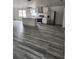 Open-concept kitchen featuring stainless steel appliances and a center island at 3446 Cypress Point Cir, St Cloud, FL 34772