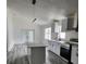 Modern kitchen featuring new stainless steel appliances, island, and eat in space at 3446 Cypress Point Cir, St Cloud, FL 34772