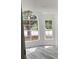 Bright living room boasting lots of natural light from the large windows at 3446 Cypress Point Cir, St Cloud, FL 34772