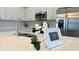 Close up on a Quartz countertop in a bright kitchen with stainless steel appliances at 3498 Sw 131St Place Rd, Ocala, FL 34473