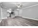 Open floor plan showcases the light and bright living room, dining space, and kitchen with island at 380 Lake Ontario Ct # 201, Altamonte Springs, FL 32701