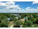 Beautiful community park with walking trails, playground, tennis court, and lake views at 383 Remington Dr, Oviedo, FL 32765