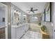 Bright bathroom features double sinks, a soaking tub, and modern fixtures at 383 Remington Dr, Oviedo, FL 32765