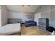 Spacious bedroom with ample natural light, ceiling fan, and comfortable furniture at 383 Remington Dr, Oviedo, FL 32765