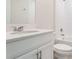 Bright bathroom vanity with double sink, updated fixtures, and quartz counter at 3971 Guernsey Bnd, St Cloud, FL 34772