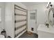 Bathroom with shower and tub combo, white vanity, and tile floors at 513 Dew Drop Cv, Casselberry, FL 32707