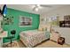 Bright bedroom with a large window, neutral decor, and comfortable furnishings at 513 Dew Drop Cv, Casselberry, FL 32707