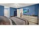 Spacious main bedroom features carpet flooring and natural light coming from a sliding glass door at 513 Dew Drop Cv, Casselberry, FL 32707