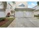 Attractive townhome featuring a well-manicured lawn, two car garage, and a welcoming, aesthetically pleasing exterior at 6057 Lake Pointe Dr # 408, Orlando, FL 32822