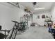 Spacious garage with storage racks, bikes, and ample room for parking at 6057 Lake Pointe Dr # 408, Orlando, FL 32822