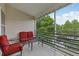 Relax on this screened porch overlooking the water, a tranquil retreat to unwind and enjoy nature's beauty at 6057 Lake Pointe Dr # 408, Orlando, FL 32822