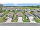 An aerial perspective showcases a well-planned community with manicured lawns and varied home styles at 8413 Sw 54Th Loop, Ocala, FL 34481