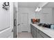 Bathroom boasts double sink vanity, granite counters, and modern fixtures at 8413 Sw 54Th Loop, Ocala, FL 34481