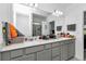 Bathroom featuring dual sinks, spacious vanity with lots of countertop space at 8413 Sw 54Th Loop, Ocala, FL 34481