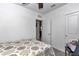 Cozy bedroom with neutral decor, ceiling fan and closet at 8413 Sw 54Th Loop, Ocala, FL 34481