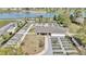 A community garden near a lake features plots for residents, a covered picnic area, and ample parking at 8413 Sw 54Th Loop, Ocala, FL 34481
