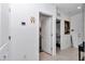 Hallway with tiled floor leads to bedroom and bathroom at 8413 Sw 54Th Loop, Ocala, FL 34481