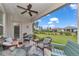 Relaxing patio with comfortable seating and views of lush green lawn at 8413 Sw 54Th Loop, Ocala, FL 34481