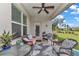 Cozy outdoor patio with ample seating and a view of the backyard at 8413 Sw 54Th Loop, Ocala, FL 34481
