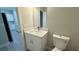 Powder room featuring a modern vanity with a white countertop and a toilet at 851 Marion Oaks Mnr, Ocala, FL 34473