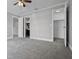 Primary bedroom showcasing multiple doors with access to bathroom and closet at 123 Tuxpan Ln, Kissimmee, FL 34743