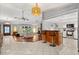 Open living area featuring a breakfast bar that connects the kitchen and inviting seating area at 1247 Rosemary Dr, Orlando, FL 32807