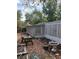 Backyard featuring a wooden deck and a garden at 128 N Sunland Dr, Sanford, FL 32773