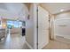 Bathroom access to kitchen and living room with bathtub, shower, and a toilet at 13427 Blue Heron Beach Dr # 306, Orlando, FL 32821