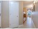 Hallway view with bunk room access and view into the living area at 13427 Blue Heron Beach Dr # 306, Orlando, FL 32821