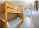 View of bunk room with hallway access and views into the living space at 13427 Blue Heron Beach Dr # 306, Orlando, FL 32821