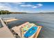 Kayaks ready for use at the community lake access point on a beautiful day at 13427 Blue Heron Beach Dr # 306, Orlando, FL 32821