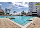 Expansive pool area with ample seating and clear blue water, ideal for relaxation at 13427 Blue Heron Beach Dr # 306, Orlando, FL 32821
