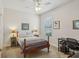 Simple bedroom with neutral walls, a ceiling fan, and ample sunlight at 1386 Longley Pl, Deland, FL 32724
