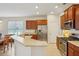 Well-equipped kitchen with stainless steel appliances and ample counter space for meal preparation at 1386 Longley Pl, Deland, FL 32724
