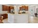 Bright kitchen featuring stainless steel appliances, breakfast bar, and eat in kitchen area at 1386 Longley Pl, Deland, FL 32724