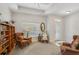 Comfortable living room features a tray ceiling, neutral walls, and lots of natural light at 1386 Longley Pl, Deland, FL 32724