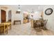 Spacious kitchen with a breakfast bar and adjacent dining area, ideal for entertaining guests at 140 Rangeline Woods Cv, Longwood, FL 32750