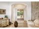 Living room featuring tile flooring, view of the screened patio, with neutral walls and natural light at 140 Rangeline Woods Cv, Longwood, FL 32750