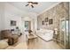 Cozy living room with tile flooring, complemented by natural light and stylish decor at 140 Rangeline Woods Cv, Longwood, FL 32750