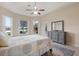 Bright primary bedroom with large windows offering a pool view and natural light at 14174 Islamorada Dr, Orlando, FL 32837