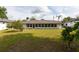 Spacious backyard perfect for outdoor activities and relaxation with ample green space at 1418 Oregon St, Orlando, FL 32803