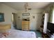 Cozy bedroom with a comfortable bed, soft lighting, and ample closet space at 1418 Oregon St, Orlando, FL 32803