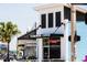 Modern coffee shop exterior featuring bold signage, sleek design and inviting atmosphere, perfect for a coffee break at 1418 Oregon St, Orlando, FL 32803