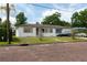 Charming single-story home with well-maintained landscaping and a brick-paved street at 1418 Oregon St, Orlando, FL 32803