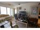 Spacious living room with large windows offering natural light and comfortable seating for relaxing and entertaining guests at 1418 Oregon St, Orlando, FL 32803
