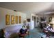 Cozy living room featuring comfortable seating, charming decor, and ample natural light at 1418 Oregon St, Orlando, FL 32803